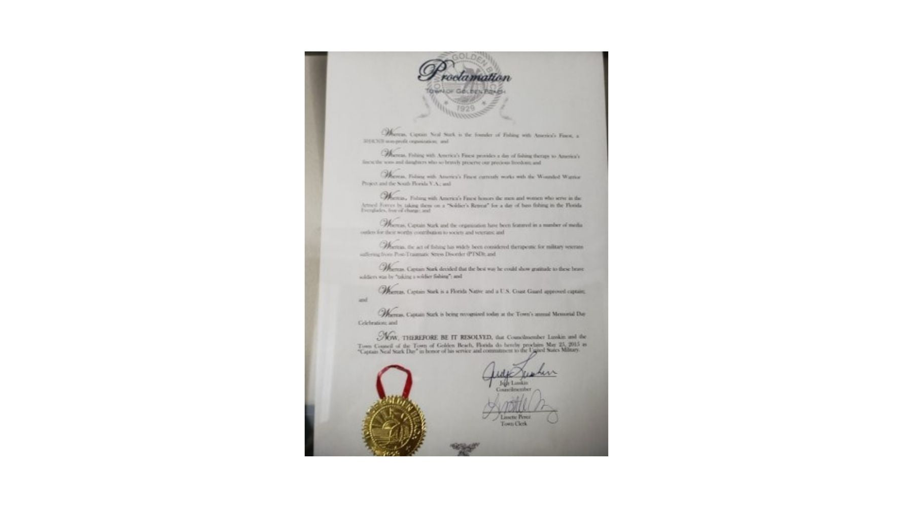 Document with a seal and signature on a white background