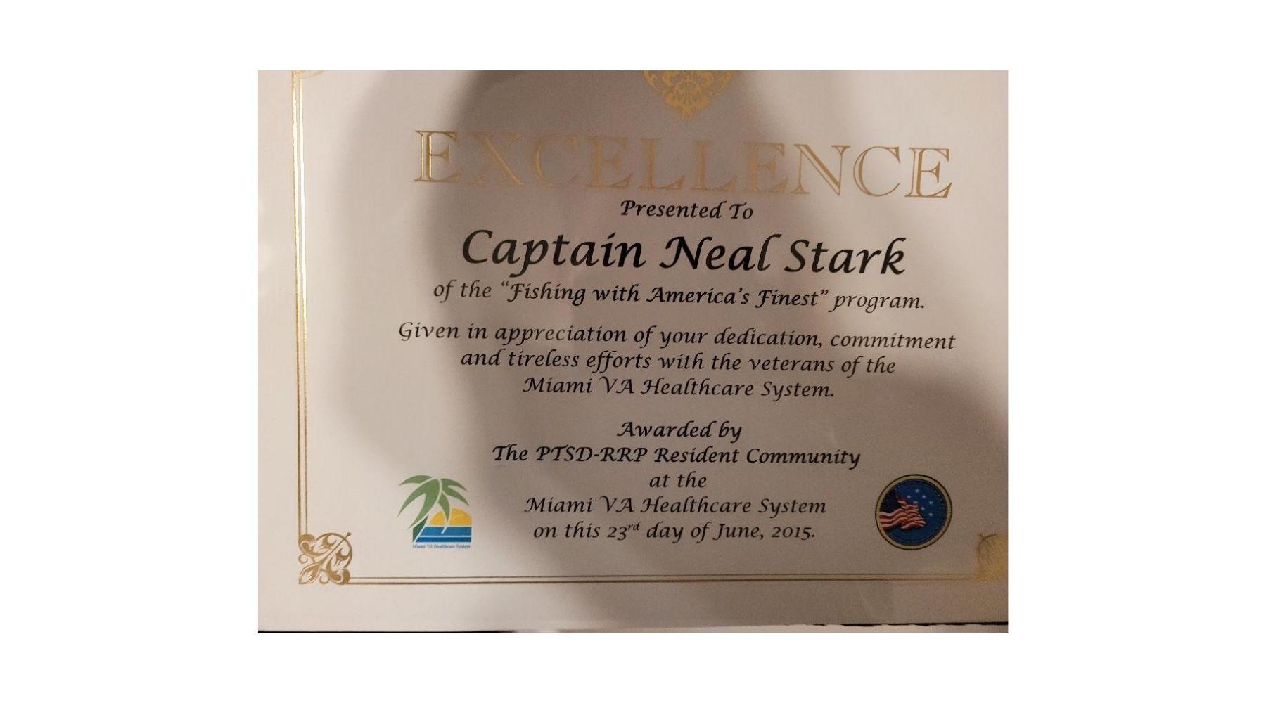 Certificate of Excellence presented to Captain Neal Stark with text and logos on a white background