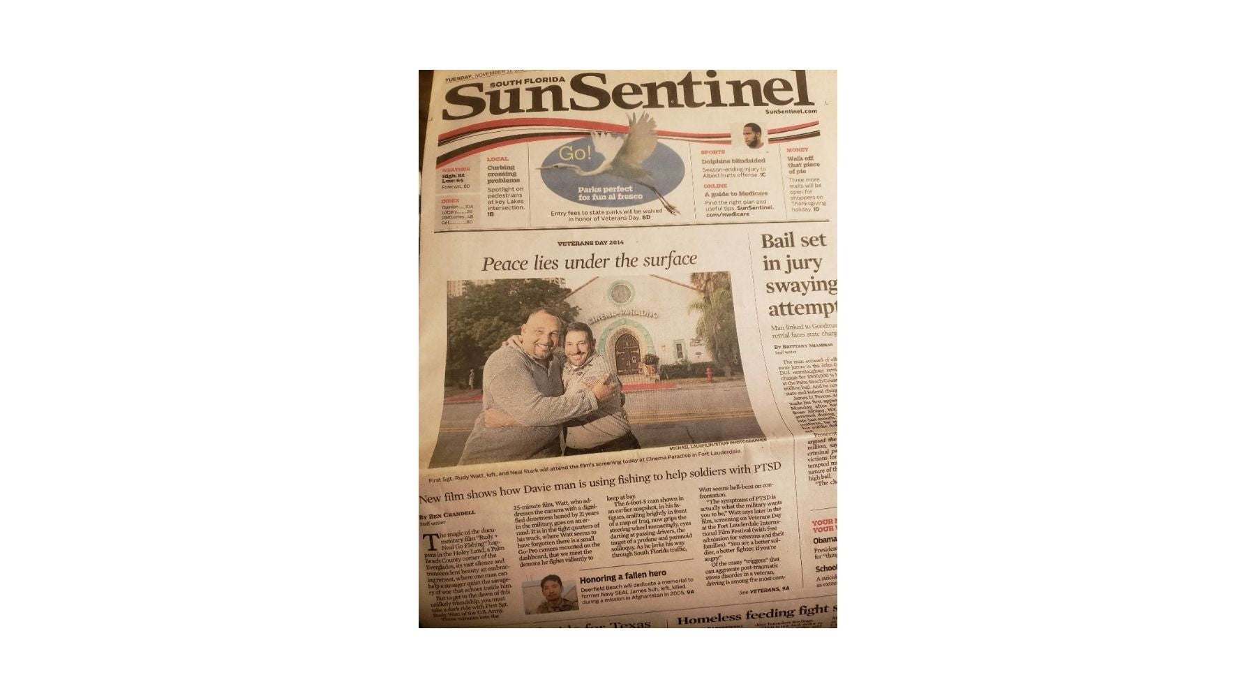 Sun Sentinel newspaper with a couple on the front page